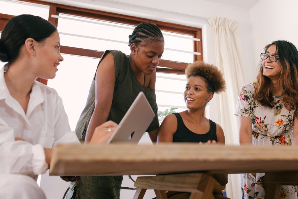 Women marketers discussing digital marketing strategies